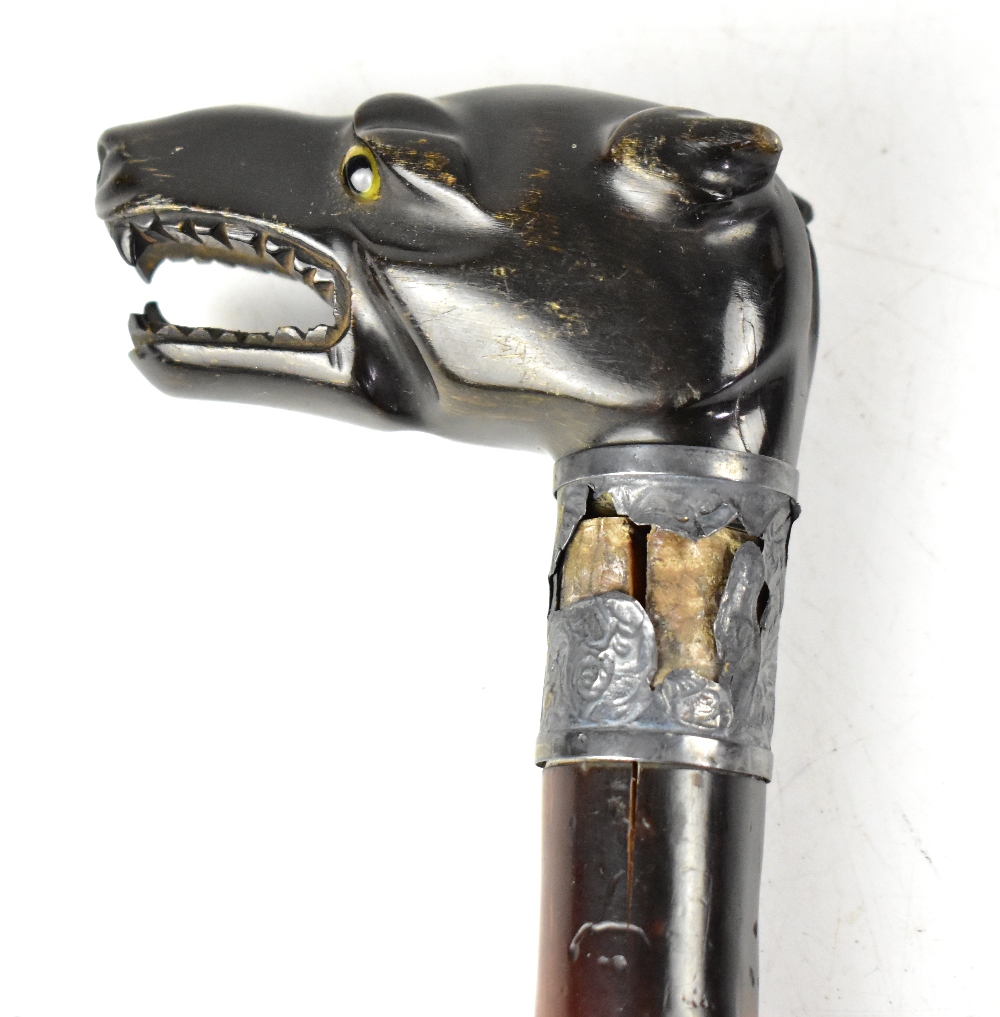 A late 19th early 20th century blackthorn walking stick with carved wooden handle in the form of a - Image 4 of 5