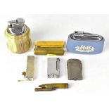 Various lighters to include a trench art bullet case lighter, a Wedgwood jasperware table lighter,