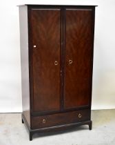 STAG; a two-piece mahogany bedroom suite comprising a double wardrobe,