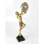 An Art Deco style silvered spelter figural timepiece, height 56cm.