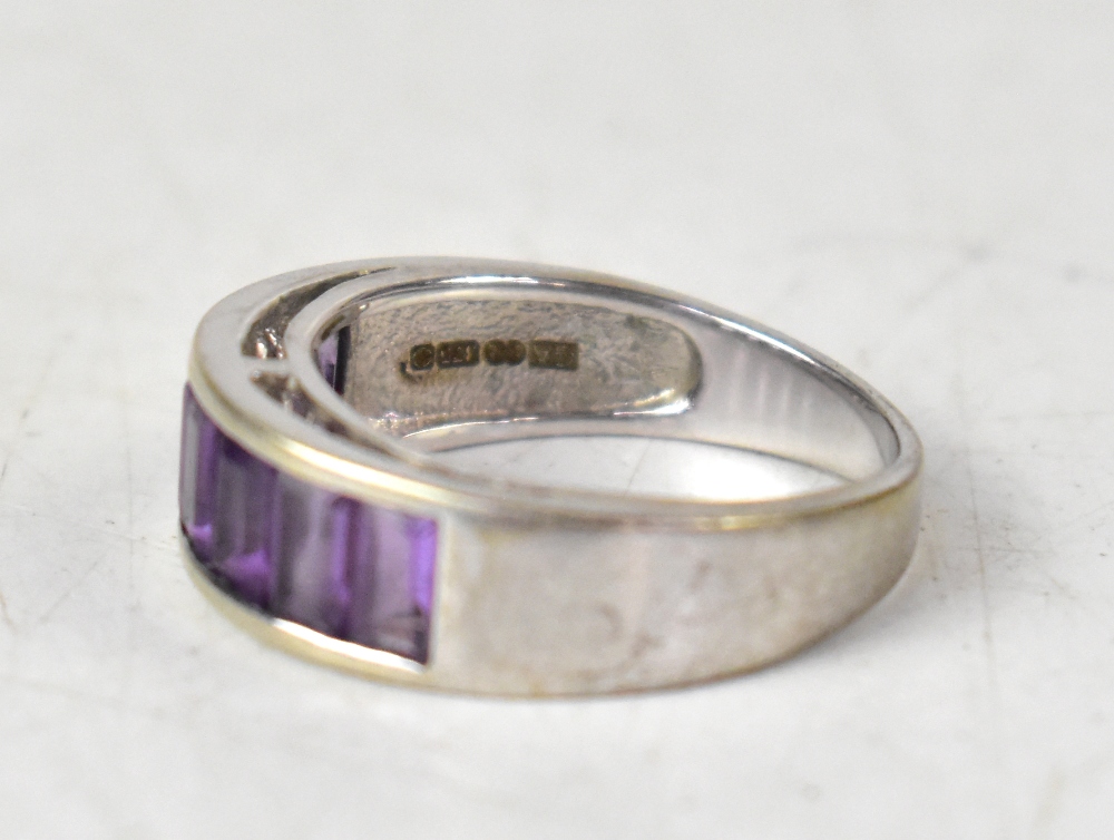 A modern 9ct white gold ring, pavé set with seven emerald cut amethyst stones, size O, approx 4.4g. - Image 2 of 3