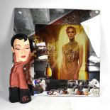 A large plastic Christian Dior shop display bust,