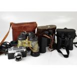 A pair of WWII period night sight binoculars in leather carrying case,