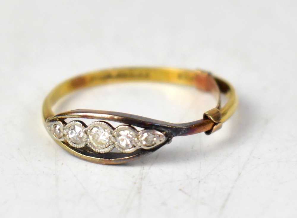 An 18ct yellow gold five-stone ring, the five graduated diamonds set in a white gold mount,