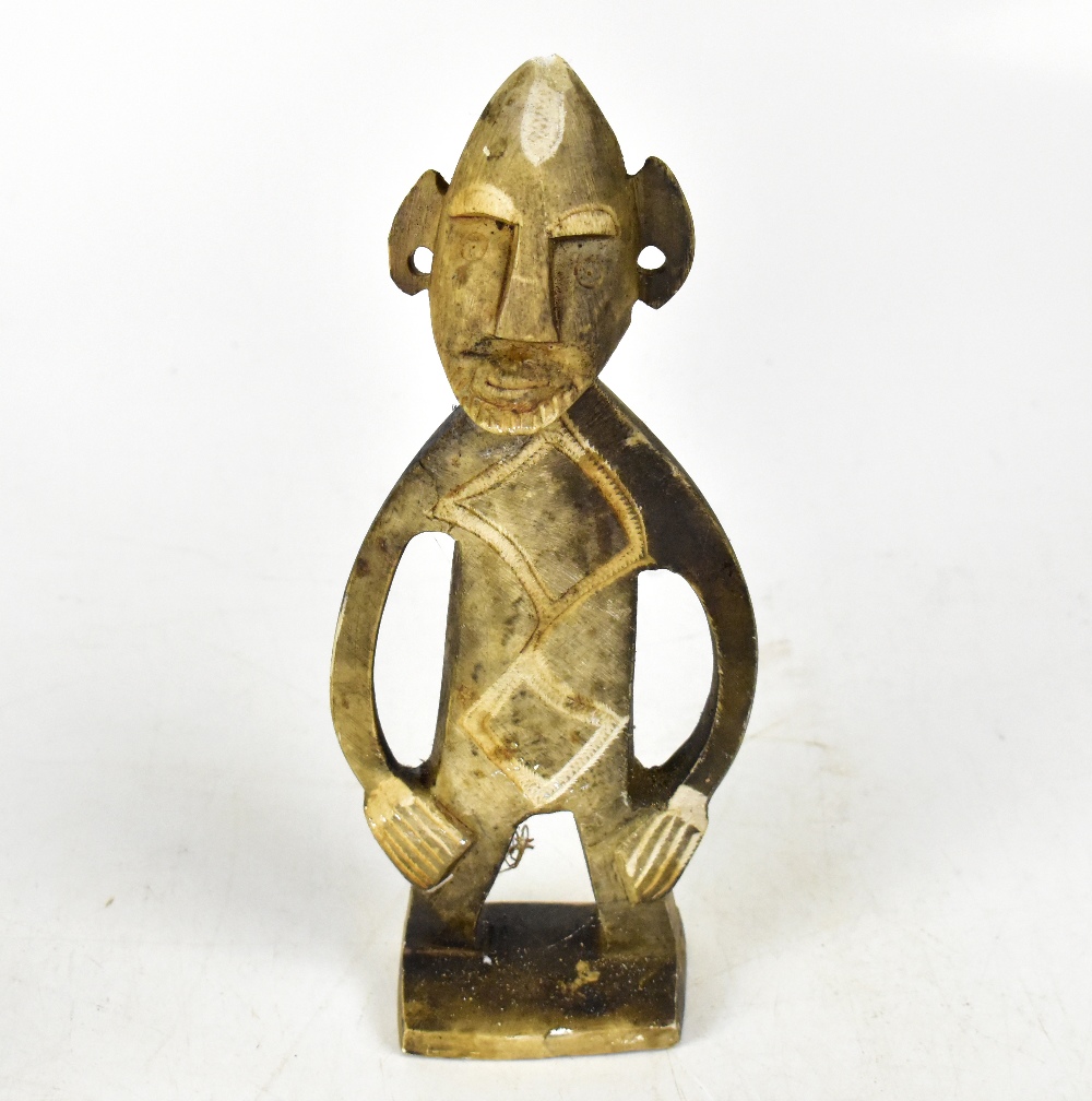 An African carved wooden tribal figure with traces of pigmentation, height 34cm, - Image 5 of 5