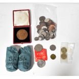 A quantity of miscellaneous coins, mostly British,