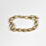 A 9ct gold fancy oval link bracelet with ring fastener, length approx 18cm, approx 13.2g.