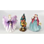 ROYAL DOULTON; three porcelain figures comprising HN2103 'The Mask Seller',