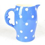 T G GREEN & CO; a blue Domino pattern jug with unusual 'Man in the Moon' handle,