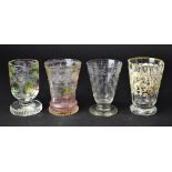Three 19th century Bohemian glasses comprising an octagonal glass with cream enamel scroll,