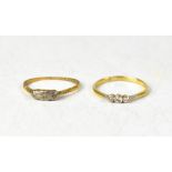 Two 18ct gold rings comprising one with a row of three small bezel set diamonds in platinum,