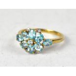 A 9ct gold apatite and tiny diamond chip flowerhead ring, size P, approx 2.2g.