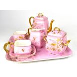 A French porcelain breakfast tea set on a tray,