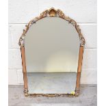 A 1930s Art Deco window-style bevel edge mirror, flanked by two bevel edge copper tone panels,