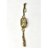 An Art Deco c1930s 9ct gold wristwatch of tank shape,