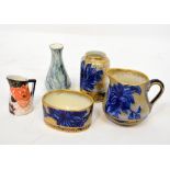 Five pieces of cabinet porcelain to include three Royal Doulton transfer blue and gilt-heightened