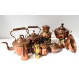A good quantity of mixed copper and brass to include kettles, two large and two small,
