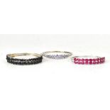 Three sterling silver hinged bangles comprising one of feathered floral design,