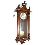 A Victorian German walnut cased eight day twin-weight Vienna wall clock,