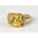 A 9ct Lehrer Torus citrine and diamond ring,