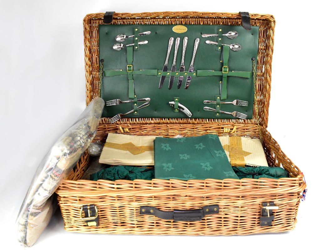 A Fortnum & Mason wicker basket picnic set, in unused condition,