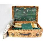 A Fortnum & Mason wicker basket picnic set, in unused condition,