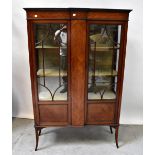 An Edwardian inlaid mahogany display cabinet with pair of astragal glazed doors flanking a central