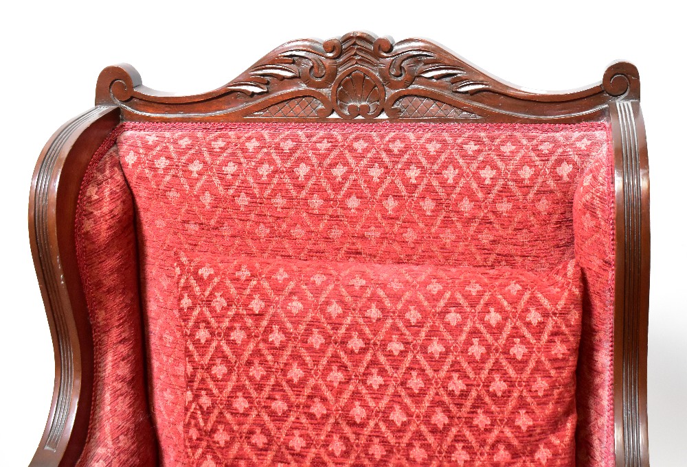 A reproduction walnut framed armchair with red upholstery and carved acanthus leaf decoration, - Image 2 of 3