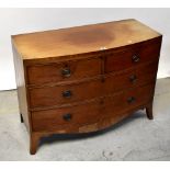 A Georgian mahogany bow-fronted chest of two short and two long drawers,
