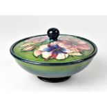 MOORCROFT; a blue/green ground 'Hibiscus' pattern covered bowl,