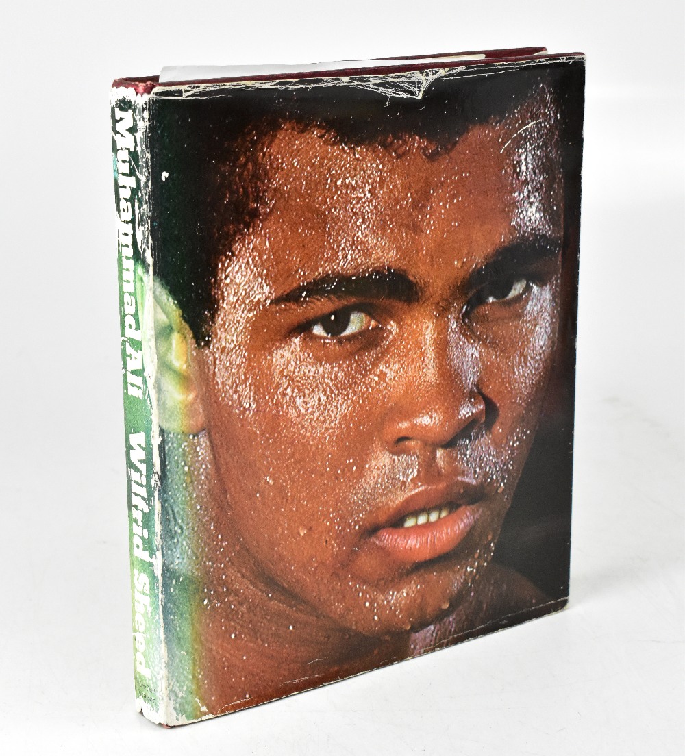 MUHAMMAD ALI; a single volume bearing the signature of the boxing megastar twice, one dated 1976. - Image 3 of 3