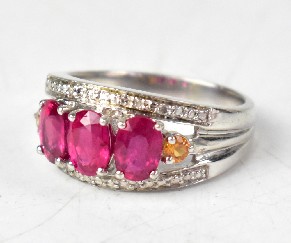 Five hallmarked sterling silver rings, comprising a ruby, sapphire and diamond ring, - Image 4 of 6