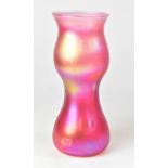 JOHN DITCHFIELD; a pink iridescent vase of waisted form, etched signature to the base, height 30cm.