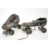 Two pairs of retro 1970s roller boots,