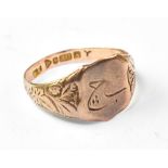 A gentlemen's vintage 9ct rose gold signet ring, with partial engraved symbol,
