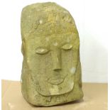 A contemporary carved Lake District stone sculpture of triangular form,