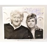 DOCTOR WHO; a black and white photograph bearing the signature of Jon Pertwee, dated 1996.