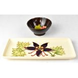 MOORCROFT; a rectangular cream ground 'Columbine' pattern pin dish, impressed marks, width 20cm,