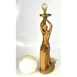 An Art Deco style gilded plaster table lamp modelled as a nude female, with globular shade,