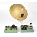 A WWI Brodie-type Warden's helmet, together with two Morse code machines (3).