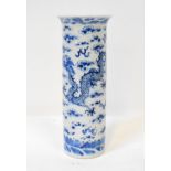 A 19th century Chinese blue and white cylindrical vase with flared rim,