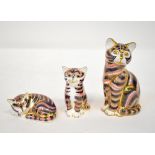 ROYAL CROWN DERBY; three Imari decorated porcelain cat/kitten paperweights of similar design,