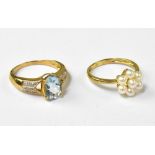 A 9ct gold ring set with pale blue oval cut stone, size N,