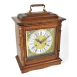 JUNGHANS; a walnut cased eight day mantel clock,