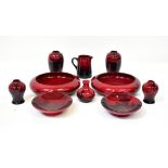 ROYAL DOULTON; ten pieces of red flambé ware, all marked seconds to the base,