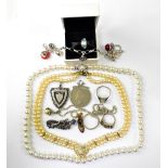 A small quantity of mixed costume jewellery to include a 9ct gold coin necklace mount,