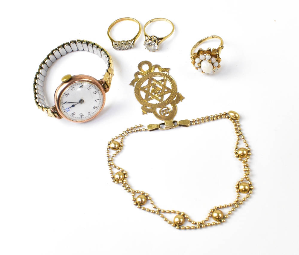 A small quantity of jewellery comprising a 9ct gold ladies' wristwatch,