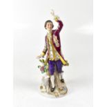 SITZENDORF; an early 20th century ceramic figure of a gentleman in 18th century period costume,