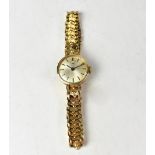 TISSOT; a ladies' 9ct gold wristwatch,