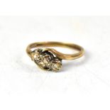 A 9ct gold three-stone diamond ring,